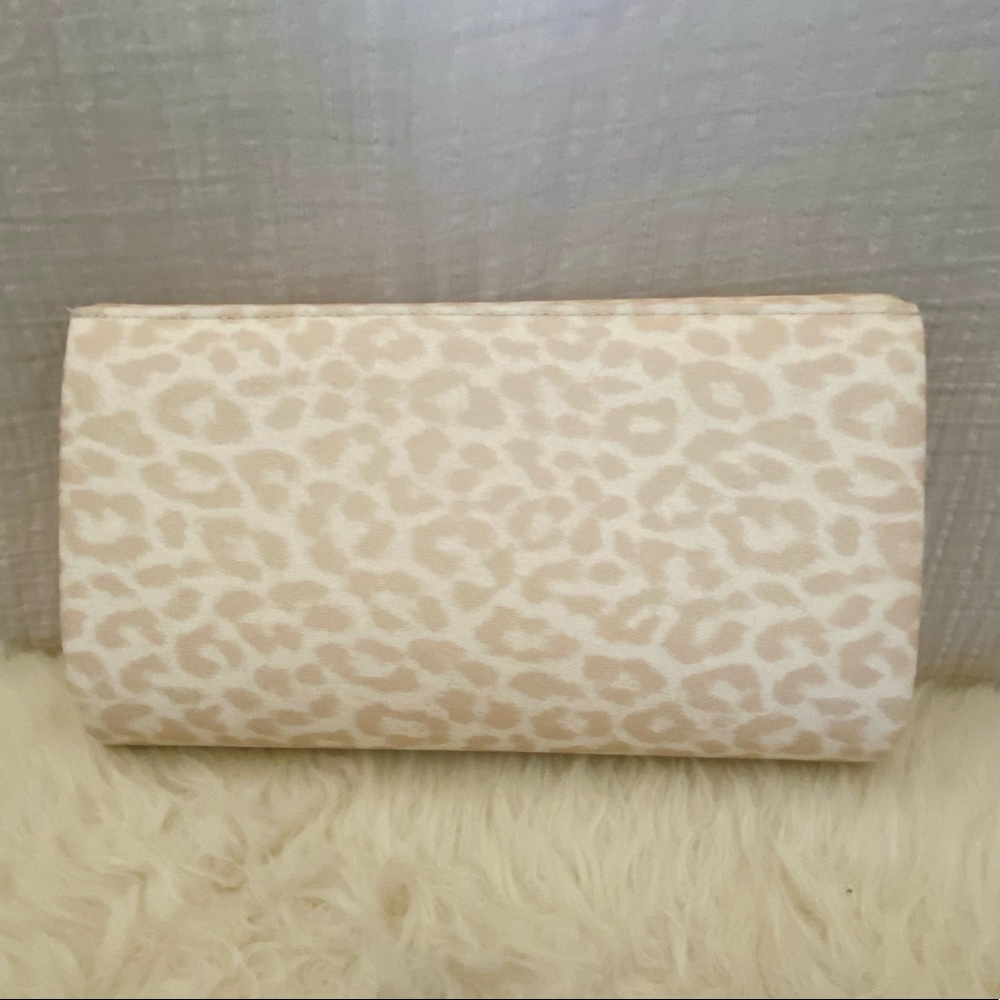 Small gold and white clutch